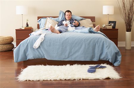 flu season - Man Sick in Bed Stock Photo - Premium Royalty-Free, Code: 600-00917335