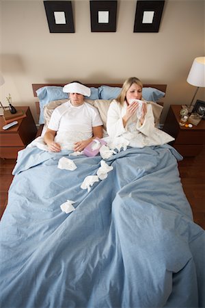 picture of cough and cold person - Sick Couple in Bed Stock Photo - Premium Royalty-Free, Code: 600-00917355