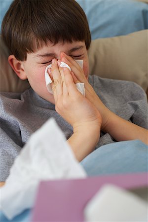 picture of cough and cold person - Boy Blowing His Nose Stock Photo - Premium Royalty-Free, Code: 600-00917428