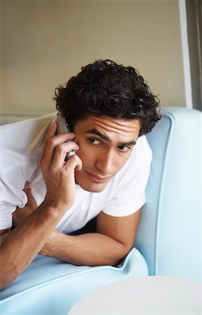 ecuadorian ethnicity - Man Using Cell Phone Stock Photo - Premium Royalty-Free, Code: 600-00917460