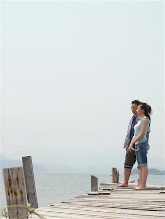 simsearch:600-00910373,k - Couple Standing on Dock Stock Photo - Premium Royalty-Free, Code: 600-00910383