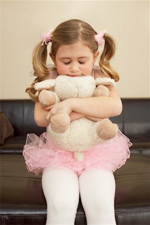 simsearch:700-00554038,k - Girl Hugging Stuffed Animal Stock Photo - Premium Royalty-Free, Code: 600-00934404