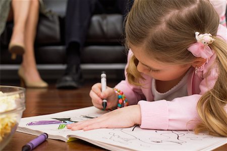 father daughter feet - Girl Lying on Floor Colouring in Book, Parents on Sofa Stock Photo - Premium Royalty-Free, Code: 600-00934441