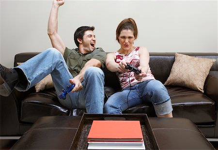 Couple Playing Video Game Stock Photo - Premium Royalty-Free, Code: 600-00933811