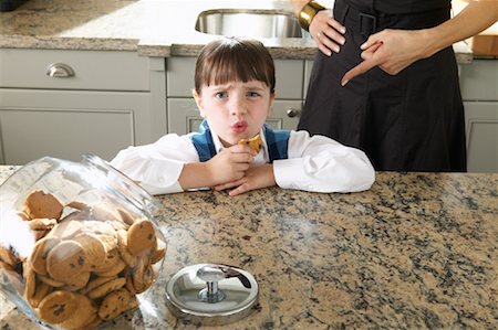 stealing (not forced entry) - Girl Taking Cookie from Jar Stock Photo - Premium Royalty-Free, Code: 600-00947951