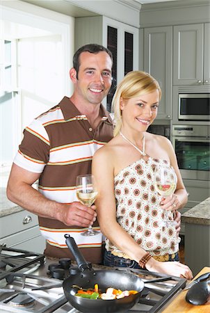 simsearch:400-05740111,k - Portrait of Couple in Kitchen Stock Photo - Premium Royalty-Free, Code: 600-00947986