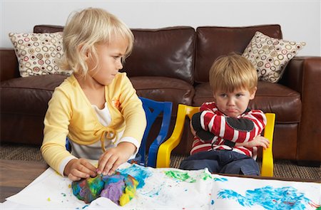 sister angry with brother - Brother and Sister Playing with Plasticine Stock Photo - Premium Royalty-Free, Code: 600-00948173