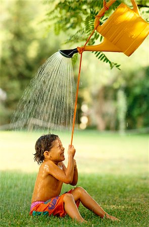 simsearch:700-00280017,k - Boy Playing Outdoors Stock Photo - Premium Royalty-Free, Code: 600-00948327