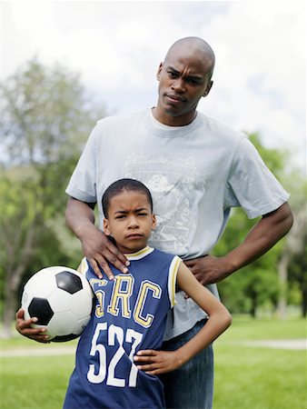 simsearch:700-00069467,k - Portrait of Father and Son Outdoors Stock Photo - Premium Royalty-Free, Code: 600-00948570