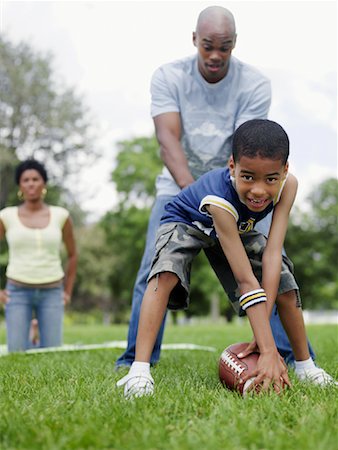 Family Playing in Park Stock Photo - Premium Royalty-Free, Code: 600-00948573