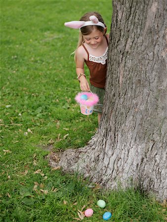 easter in canada - Girl Collecting Easter Eggs Stock Photo - Premium Royalty-Free, Code: 600-00948604