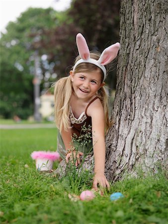 easter in canada - Girl Collecting Easter Eggs Stock Photo - Premium Royalty-Free, Code: 600-00948605