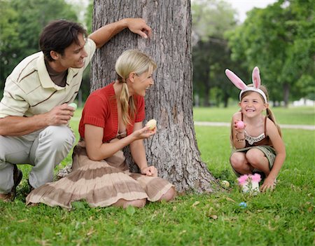 easter in canada - Family in Park, Easter Egg Hunt Stock Photo - Premium Royalty-Free, Code: 600-00948608