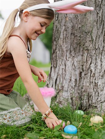 easter in canada - Girl Collecting Easter Eggs Stock Photo - Premium Royalty-Free, Code: 600-00948603