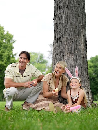 easter in canada - Family in Park, Easter Egg Hunt Stock Photo - Premium Royalty-Free, Code: 600-00948610