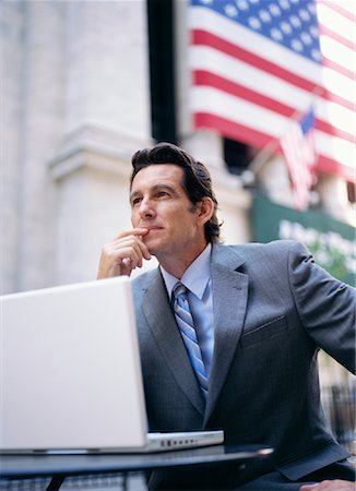 simsearch:700-00281308,k - Businessman with Laptop Computer by American Flag Stock Photo - Premium Royalty-Free, Code: 600-00948865