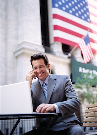 simsearch:700-00281308,k - Businessman with Laptop Computer by American Flag Stock Photo - Premium Royalty-Free, Code: 600-00948866