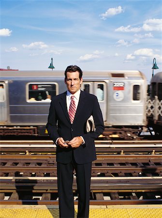simsearch:700-00082932,k - Businessman Waiting For Train Stock Photo - Premium Royalty-Free, Code: 600-00948897