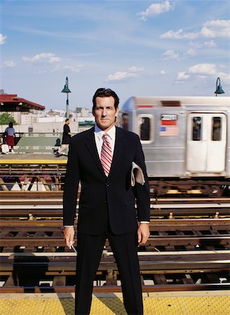 simsearch:600-02637306,k - Businessman Waiting For Train Stock Photo - Premium Royalty-Free, Code: 600-00948898