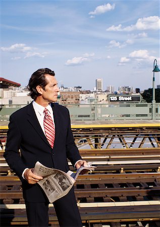 simsearch:700-00082932,k - Businessman Waiting for Train Stock Photo - Premium Royalty-Free, Code: 600-00948900