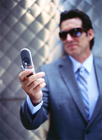simsearch:700-00695760,k - Businessman with Cellular Phone Stock Photo - Premium Royalty-Free, Code: 600-00948915