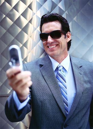 simsearch:700-00695760,k - Businessman with Cellular Phone Stock Photo - Premium Royalty-Free, Code: 600-00948913