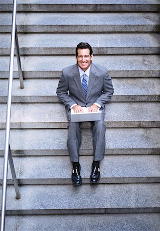 simsearch:600-02756616,k - Portrait of Businessman Using Laptop Computer Foto de stock - Sin royalties Premium, Código: 600-00948941