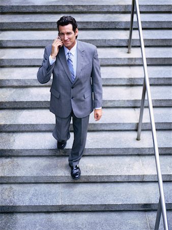 simsearch:700-00695760,k - Portrait of Businessman Using Cellular Telephone Stock Photo - Premium Royalty-Free, Code: 600-00948943