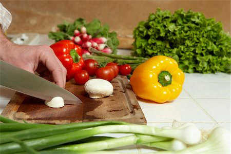 sharp - Man Chopping Vegetables Stock Photo - Premium Royalty-Free, Code: 600-00954739