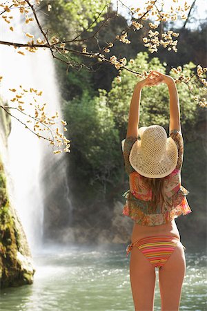 Portrait of Woman by Waterfall Stock Photo - Premium Royalty-Free, Code: 600-00955454