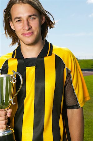 simsearch:693-06325208,k - Portrait of Soccer Champion Stock Photo - Premium Royalty-Free, Code: 600-00984032