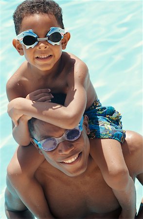 simsearch:700-01295913,k - Portrait of Father and Son In Swimming Pool Stock Photo - Premium Royalty-Free, Code: 600-00983089
