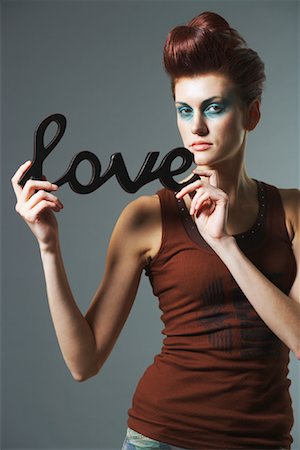 simsearch:600-02200222,k - Woman Holding Love Sign Stock Photo - Premium Royalty-Free, Code: 600-00983454