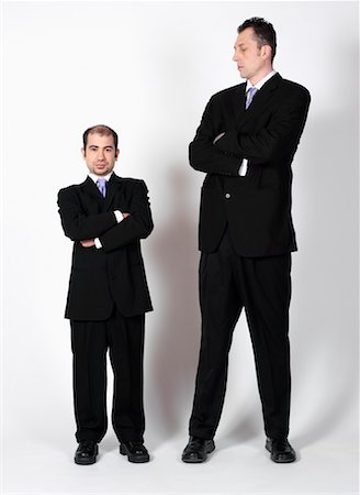 disadvantage - Short and Tall Businessmen Stock Photo - Premium Royalty-Free, Code: 600-00983733