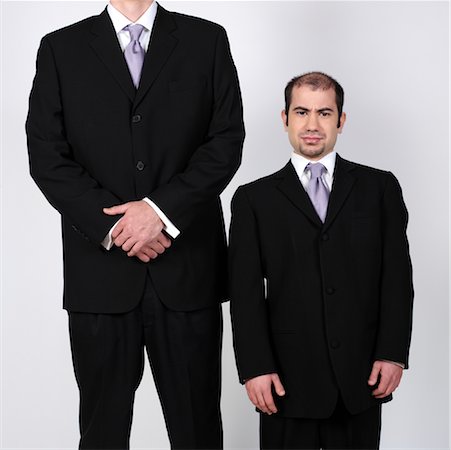 disadvantage - Short and Tall Businessmen Stock Photo - Premium Royalty-Free, Code: 600-00983744
