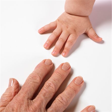 photograph old young hand - Hands of Baby and Woman Stock Photo - Premium Royalty-Free, Code: 600-00983801