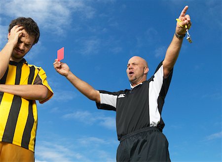 penalty - Referee Giving Red Card Stock Photo - Premium Royalty-Free, Code: 600-00983931