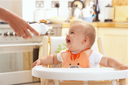 simsearch:600-01112884,k - Baby in High Chair Stock Photo - Premium Royalty-Free, Code: 600-01015379