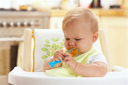 simsearch:600-01172751,k - Baby in High Chair Stock Photo - Premium Royalty-Free, Code: 600-01015381