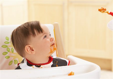 simsearch:600-01112884,k - Baby being Fed Stock Photo - Premium Royalty-Free, Code: 600-01015424