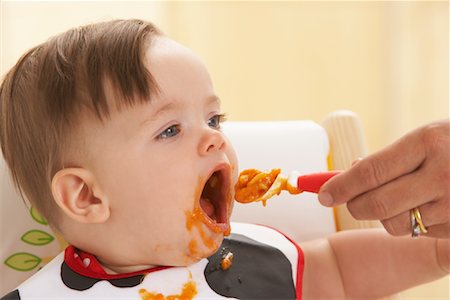 simsearch:700-02586125,k - Baby being Fed Stock Photo - Premium Royalty-Free, Code: 600-01015422