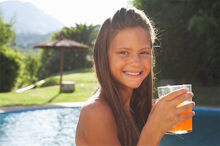 Girl Drinking Orange Juice Foto de stock - Sin royalties Premium, Código: 600-01036629