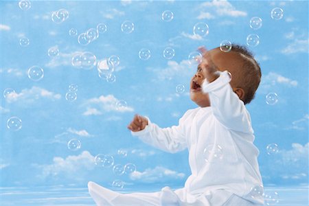 Portrait of Baby with Bubbles Stock Photo - Premium Royalty-Free, Code: 600-01036788