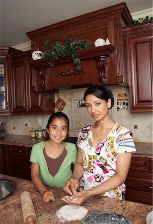 simsearch:700-02047006,k - Mother and Daughter Cooking Stock Photo - Premium Royalty-Free, Code: 600-01036849