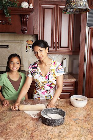 simsearch:700-02047006,k - Mother and Daughter Cooking Stock Photo - Premium Royalty-Free, Code: 600-01036854