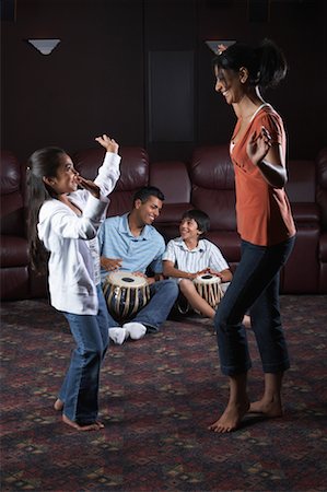 Family Dancing and Drumming Stock Photo - Premium Royalty-Free, Code: 600-01036876