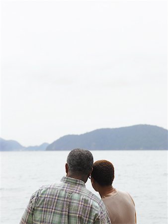 simsearch:600-00954274,k - Couple Looking over Water Stock Photo - Premium Royalty-Free, Code: 600-01036958