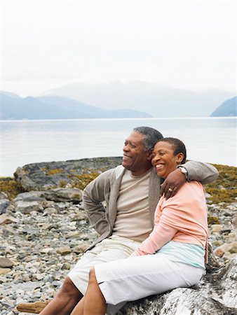 simsearch:600-02346335,k - Couple Sitting by Water Stock Photo - Premium Royalty-Free, Code: 600-01036966