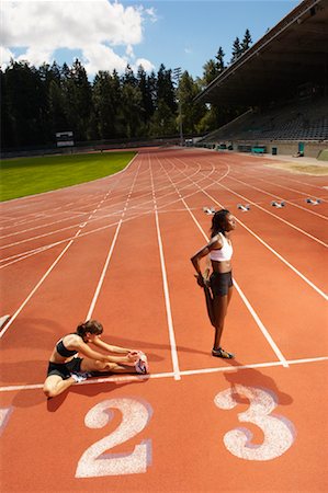 simsearch:700-01880223,k - Women Stretching on Track Stock Photo - Premium Royalty-Free, Code: 600-01037086
