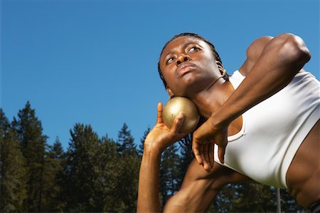 simsearch:600-00955031,k - Woman About to Throw Shot Put Stock Photo - Premium Royalty-Free, Code: 600-01037123